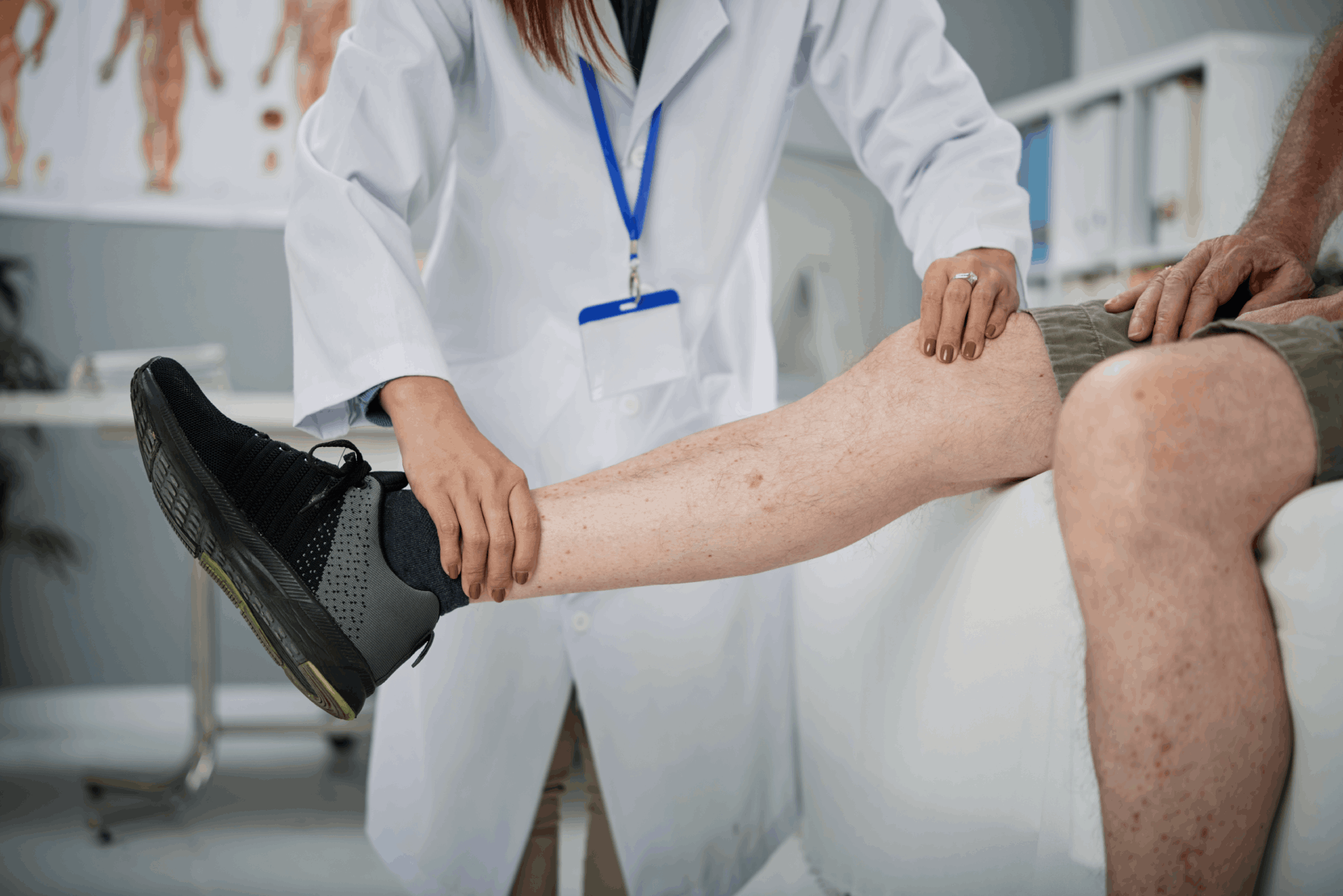 physiotherapist-palpating-leg
